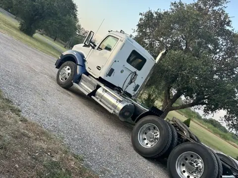 Barcenas Transportation tractor that pulls a belly dump trailer